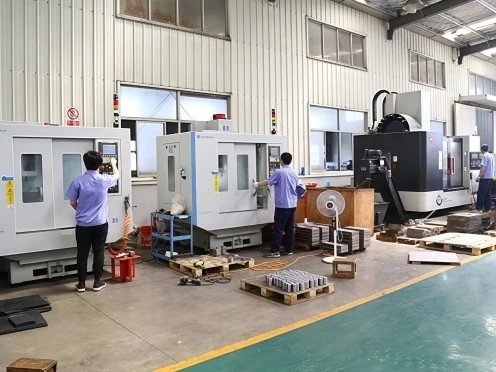 CNC equipment and personnel at the Meitar manufacturing facility. Manufacturer photograph.